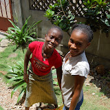 &ndash; Lucy and Ann Marie hauling rice for distribution`.......© 2007 NHA photos