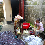  &ndash; Kadijah learns from Foday about the tye-dye process...Nazareth House Media Photos, July 2008