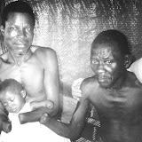  &ndash; Two men and infant child with amputated hands, May 2000, Freetown.... © 2008 Nazareth House Media, JBM Photographer