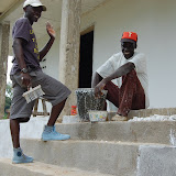  &ndash; James and his dad, Pa Foday resting a few seconds from school painting project...© 2008 Nazareth House Media