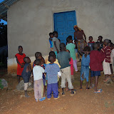  &ndash; Children gather at the church near the school to watch in anticipation the completion of their school...© 2008 Nazareth House Media