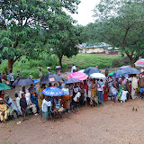  &ndash; The parents continue to wait in rain for uniforms.....© 2008 Nazareth House Media, JBM photographer