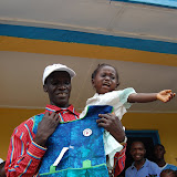  &ndash; ...© 2008 Nazareth House Media, JBM photographer, Pa Foday assists a child in receiving uniform.