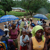  &ndash; Families of students wait in line to receive their bed nets.....© 2008 NHA photos