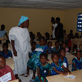  &ndash; Parents bringing childroom to Classrooms..© 2008 September Nazareth House Apostolate Media, James B. Mansaray, photographer.