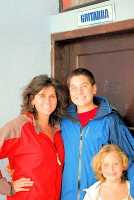 Gigi, Grant, and Gina outside the classroom before music lessons in Cotacachi, Ecuador