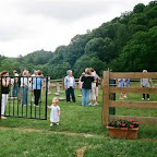 Whitney Leigh Philpott plays with the gate at the William Gleaves cemetery in Wythe County, Virginia June 2009
