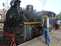 Thats a 1867 steam engine that drags up the Nilgiris Mountain train from Meetupalayam to Coonor