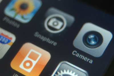 I enjoy using Polarizer for casual shots. It nicely hides the weaknesses of the tiny camera. iPhone Springboard with Camera app in focus