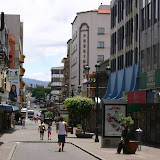 Just a trickle of people walk down Avenida Central pedestrian boulevard.