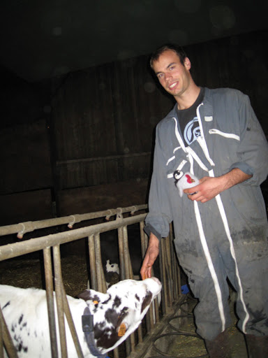Percy looks up in awe at Nicolas the dairy farmer...what a cool job he has...and thanks for showing Percy how its done, French dairy style!
