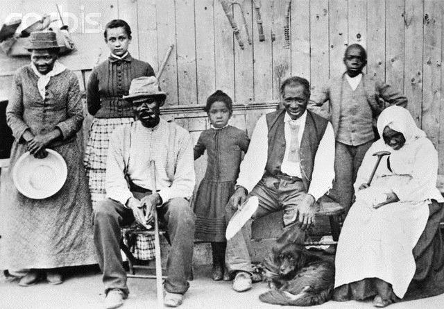 [Harriet Tubman with a few people she helped during the Civil War. She is to the far left with a pan in her hands.[3].jpg]