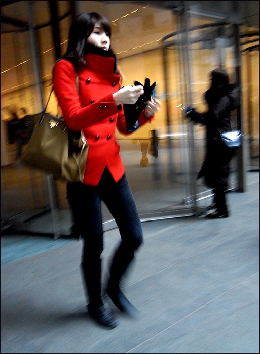 w red coat leaving moma 3 0l