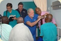 Eye surgeons making their rounds with the POST OP patients.  Next day after cataract surgery.  (l-r) Dr Richard Newsom-UK, John Rae-MS SA director, Dr Glenn Strauss,, Dr M.L. Bhala-SA . Dr Strauss compared the SA surgeons method of cataract surgery to the MSICS method.  They could see a dramatic difference between the two different methods.  MSICS had the best results.