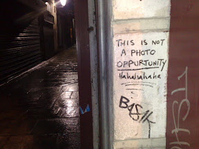 Wall graffiti reading This is not a photo opportunity hahahahaha, taken in Temple Bar, Dublin