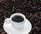 Coffee beans and cup