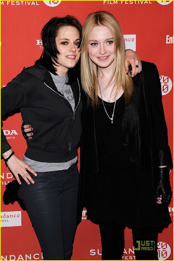 PARK CITY, UT - JANUARY 24:  Actresses Kristen Stewart (L) and Dakota Fanning attend "The Runaways" premiere during the 2010 Sundance Film Festival at Eccles Center Theatre on January 24, 2010 in Park City, Utah.  (Photo by Jemal Countess/Getty Images)