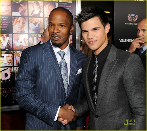 LOS ANGELES, CA - FEBRUARY 08:  Actors Jamie Foxx (L) and Taylor Lautner arrive at the premiere of New Line Cinema's "Valentine's Day" held at Grauman's Chinese Theatre on February 8, 2010 in Los Angeles, California.  (Photo by Kevin Winter/Getty Images)