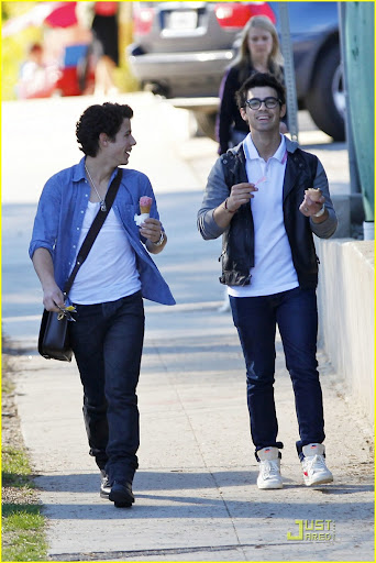 37566, LOS ANGELES, CALIFORNIA - Wednesday February 10, 2010. **EXCLUSIVE** Nick (left) and Joe (right) Jonas share a laugh after getting ice cream together in LA. Joe walked Nick to his truck and gave him a brotherly hug before departing. Joe Jonas, looking fashionable in his two-tone jacket and thick frame glasses, is seen wearing Nike high top sneakers. Nick, on the other hand, kept it more casual in an open button up shirt and shoulder bag worn with dark denim pants and black boots. Photograph: Anthony, PacificCoastNews.com**FEE MUST BE AGREED PRIOR TO USAGE** **E-TABLET/IPAD & MOBILE PHONE APP PUBLISHING REQUIRES ADDITIONAL FEES** UK OFFICE:+44 131 557 7760/7761 US OFFICE:1 310 261 9676