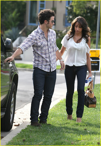 Kevin Jonas acts like the perfect gentleman, opening the car door for his new wife Danielle in Toluca Lake, as they leave his parents home
Los Angeles, California - 21.03.10
Mandatory credit: WENN.com