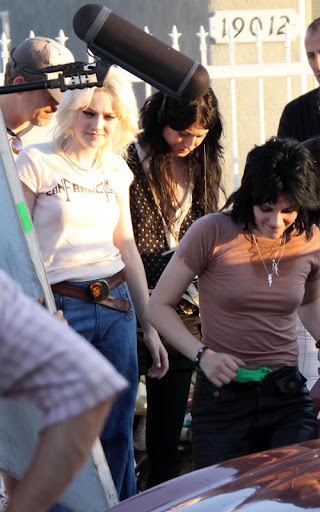 07-22-09 Los Angeles, CAActresses Kristen Stewart and Dakota Fanning on the set of their upcoming movie 'The Runaways' in Los Angeles. In a couple scenes Kristen has a neon green water gun stuffed in the front of her pants...Non-Exclusive Pix by Flynet ©2009818-307-4813  Nicolas310-869-0177  Scott