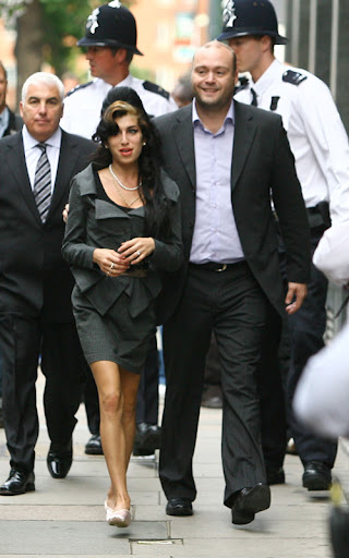 Amy Winehouse arriving at City of Westminster Magistrates Court to face charges of assault London, England - 23.07.09 Mandatory Credit: WENN.com