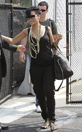 #3357420 Rihanna is all smiles as she steps off a helicopter at the 34th street Heliport in New York City, New York August 3, 2009 on her arrival back from a weekend in the Hamptons. Rihanna oddly was sporting a gold ring on that very important finger on her left hand, but it might just be to match her gold bling for today’s outing. Fame Pictures, Inc - Santa Monica, CA, USA - +1 (310) 395-0500