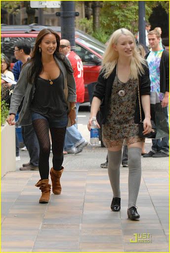 Vancouver, B.C. - Vanessa Hudgens, Jamie Chung, and Emily Browning try to sneak out of Aritzia boutique without being noticed this afternoon. The three cast mates are in town for the filming of "Sucker Punch", and sign autographs for fans while enjoying the shopping that Vancouver has to offer on their down time. GSI Media August 21, 2009 (310) 505-8447 (323) 423-9397 (310) 261-8649