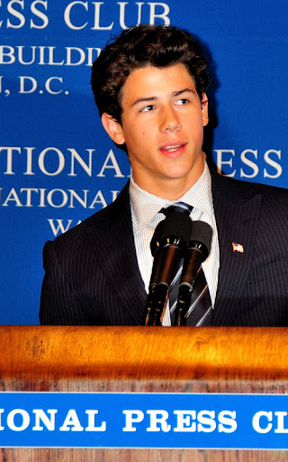 Nick Jonas speaking at the National Press Club in Washington DC, about diabetes.