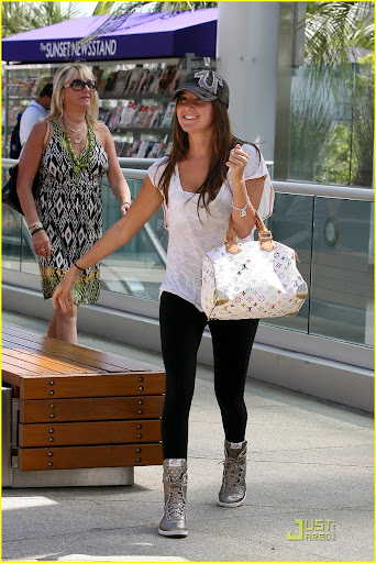 Ashley Tisdale jumps with excitement when she greets her personal trainer outside a West Hollywood gym Los Angeles, California - 25.08.09 Credit: (Mandatory) WENN.com