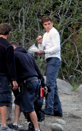 Zac Efron and Charlie Tahan filming in Vancouver, BC. Efrom was seen filming scenes for 'The Death and Life of Charlie St Cloud' with co star Charlie Tahan. The scene involved Zac pretending to fly a miniature plane. Zac was seen snacking inbetween takes on the lake in Vancovuer BC <P> Pictured: Zac Efron <B>Ref: SPL121518 260809 </B><BR/> Picture by: Splash News<BR/> </P><P> <B>Splash News and Pictures</B><BR/> Los Angeles: 310-821-2666<BR/> New York: 212-619-2666<BR/> London: 870-934-2666<BR/> photodesk@splashnews.com<BR/> </P>