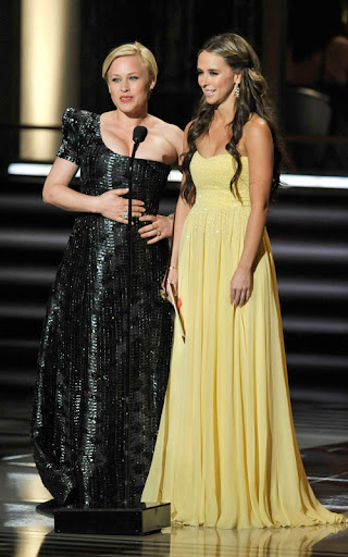 LOS ANGELES, CA - SEPTEMBER 20: Actresses Patricia Arquette (L) and Jennifer Love Hewitt present the Outstanding Writing for a Miniseries or Movie award onstage during the 61st Primetime Emmy Awards held at the Nokia Theatre on September 20, 2009 in Los Angeles, California. (Photo by Kevin Winter/Getty Images) *** Local Caption *** Patricia Arquette;Jennifer Love Hewitt