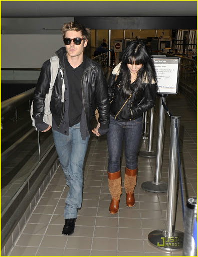 Actor Zac Efron is seen with his actress girlfriend Vanessa Hudgens showing the world how they feel about each other by holding hands after arriving back to LA from Vancouver. <P> Pictured: Zac Efron with girlfriend Vanessa Hudgens <B>Ref: SPL145289 111209 </B><BR/> Picture by: Hot Shots Worldwide<BR/> </P><P> <B>Splash News and Pictures</B><BR/> Los Angeles: 310-821-2666<BR/> New York: 212-619-2666<BR/> London: 870-934-2666<BR/> photodesk@splashnews.com<BR/> </P>