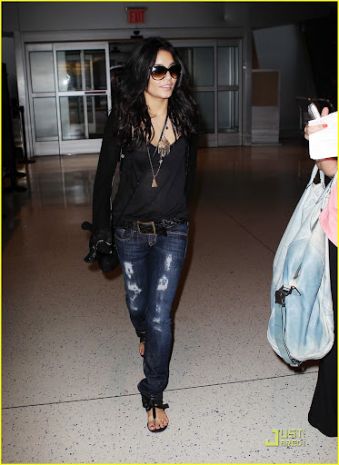 #5596214 Vanessa Hudgens is all smiles as she prepares to depart from NYC, NY on August 18, 2010 with boyfriend Zac Efron who arrived separately.
 Fame Pictures, Inc - Santa Monica, CA, USA - +1 (310) 395-0500