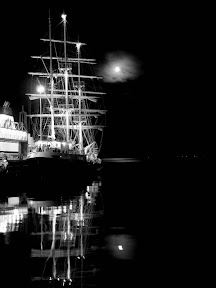 The Tenacious in at Stromness by moonlight