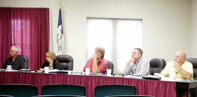 Pella City Council members (L to R) Mark De Jong, City Clerk Ronda Brown, Bruce Schiebout, Jim Mueller and Rich Savery
