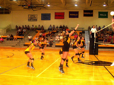 Ellie Hawkshead returns a volley to Chariton.