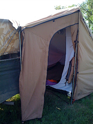 The side wing left on, with the side door and mozzie net zipped open.