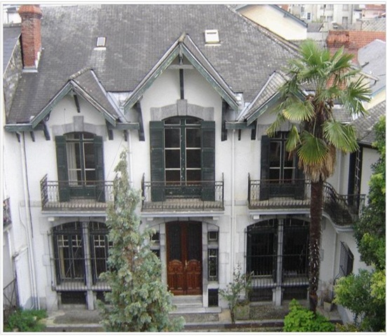 [Guadalupe House in Lourdes.jpg]