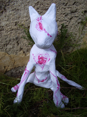 paper mache cat (lung cells, H & E) Red Cat (lung cells stained with H & E)