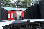 The man stage, set up for the opening scene. The pit orchestra sits in the area directly in front of the stage.