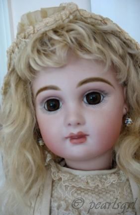 Antique bisque doll Jumeau reproduction