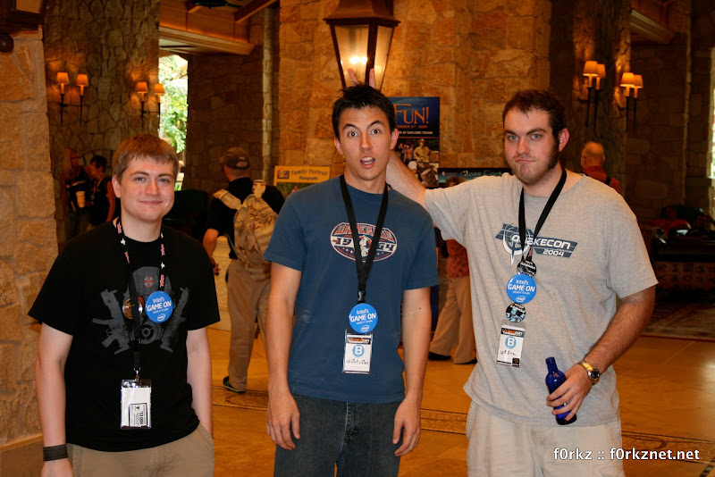 Tricky, sp00nz, and sh0ck_c0re striking a pose