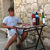 (2007) This boy wanted his picture to appear on the Susak web. He is so concentrated on his music that he didn't realize I was taking his picture!