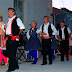 People wearing traditional costumes are performing Susak dances