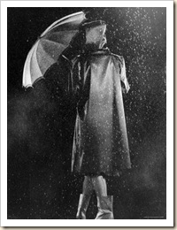1270402~Fashion-Shot-of-Model-in-Raincoat-Umbrella-and-Galoshes-Poster