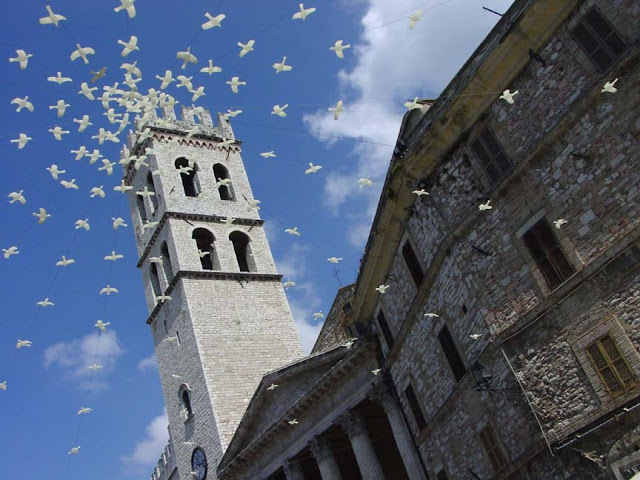 a church in Assisi decorated with plastic doves