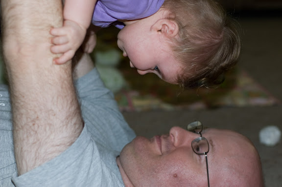 Sam playing with her Daddy.