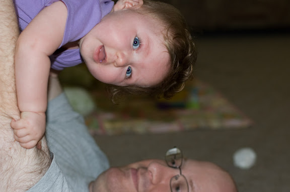 Daddy's holding me upside down by the legs... what do I do now?