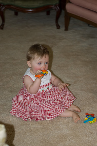 she's getting her two front, lower teeth in, so she's chewing on everything now.